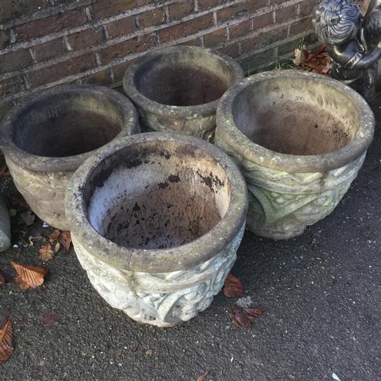 4 stone garden pots